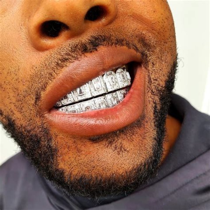 The Fascinating World of Lamar Jackson's Grillz: Style, Symbolism, and Success